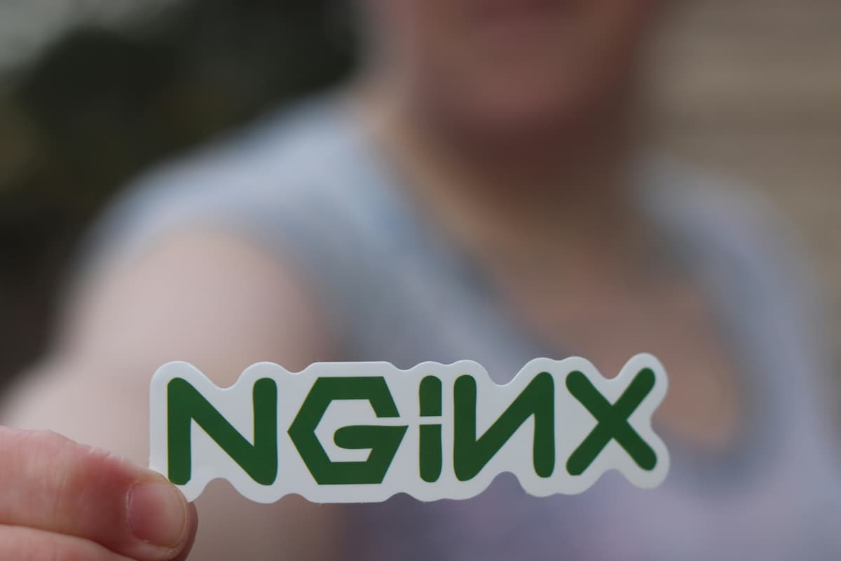 Apache vs NGINX architecture diagram showing reverse proxy implementation, load balancing, and performance characteristics